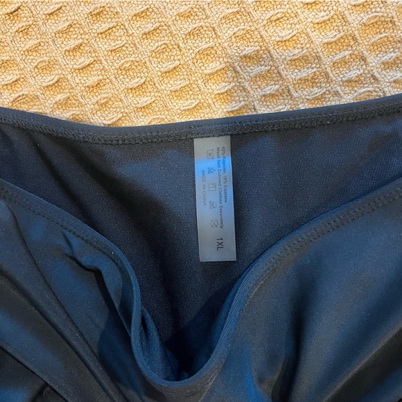 1 black,1 butterfly design one piece and 1 high waisted bottom - Picture 10 of 10